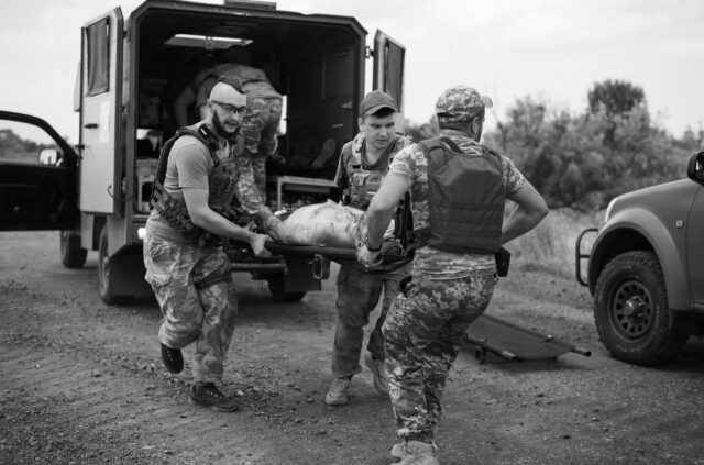 Evacuation of a wounded soldier by Ukrainian military on the Kherson frontline.